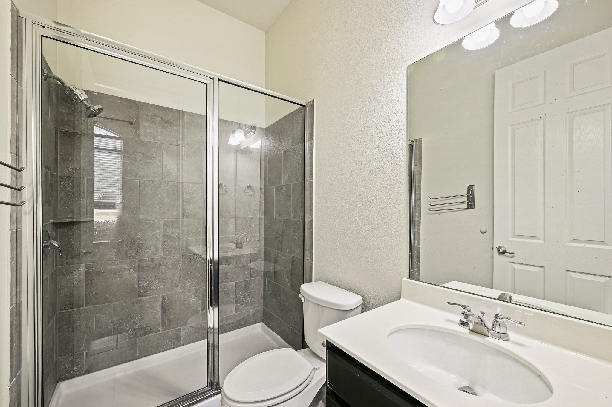 803 Wilson Ranch Place Cedar Park, TX 78613 - Photo 24 of 32 The ensuite bath is equipped with a large walk-in shower.