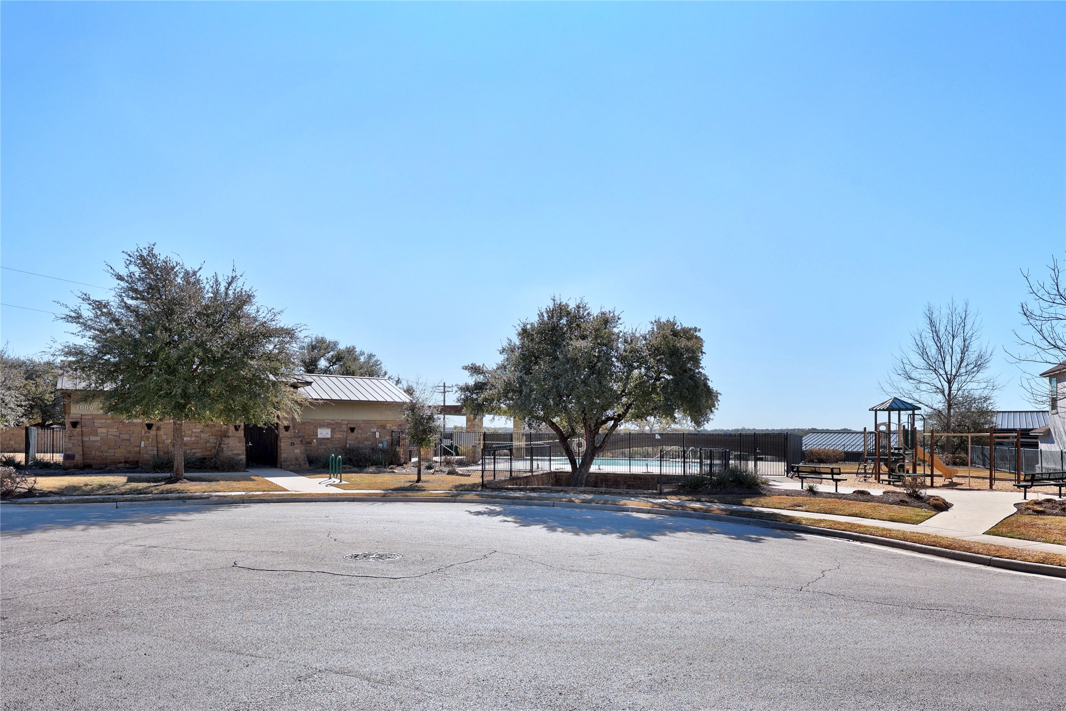 803 Wilson Ranch Place Cedar Park, TX 78613 - Photo 33 of 39 a city street with tall buildings