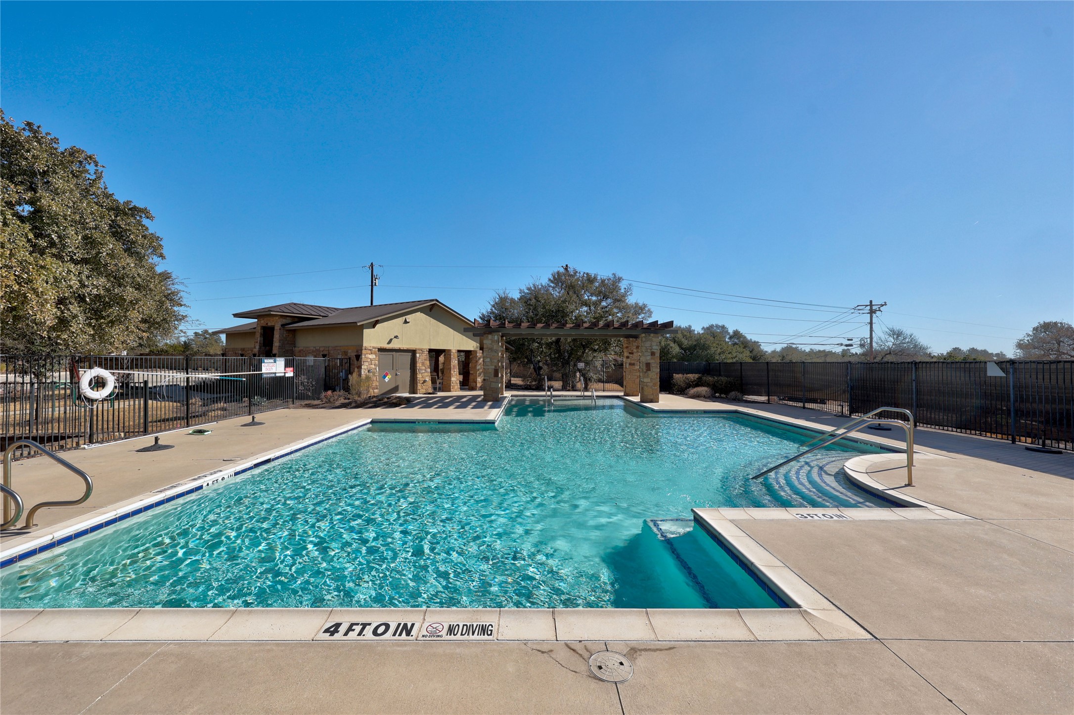 803 Wilson Ranch Place Cedar Park, TX 78613 - Photo 37 of 39 a view of a swimming pool with a yard and sitting area