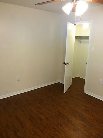 a view of a livingroom with wooden floor