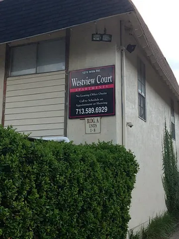 a sign on the side of a building