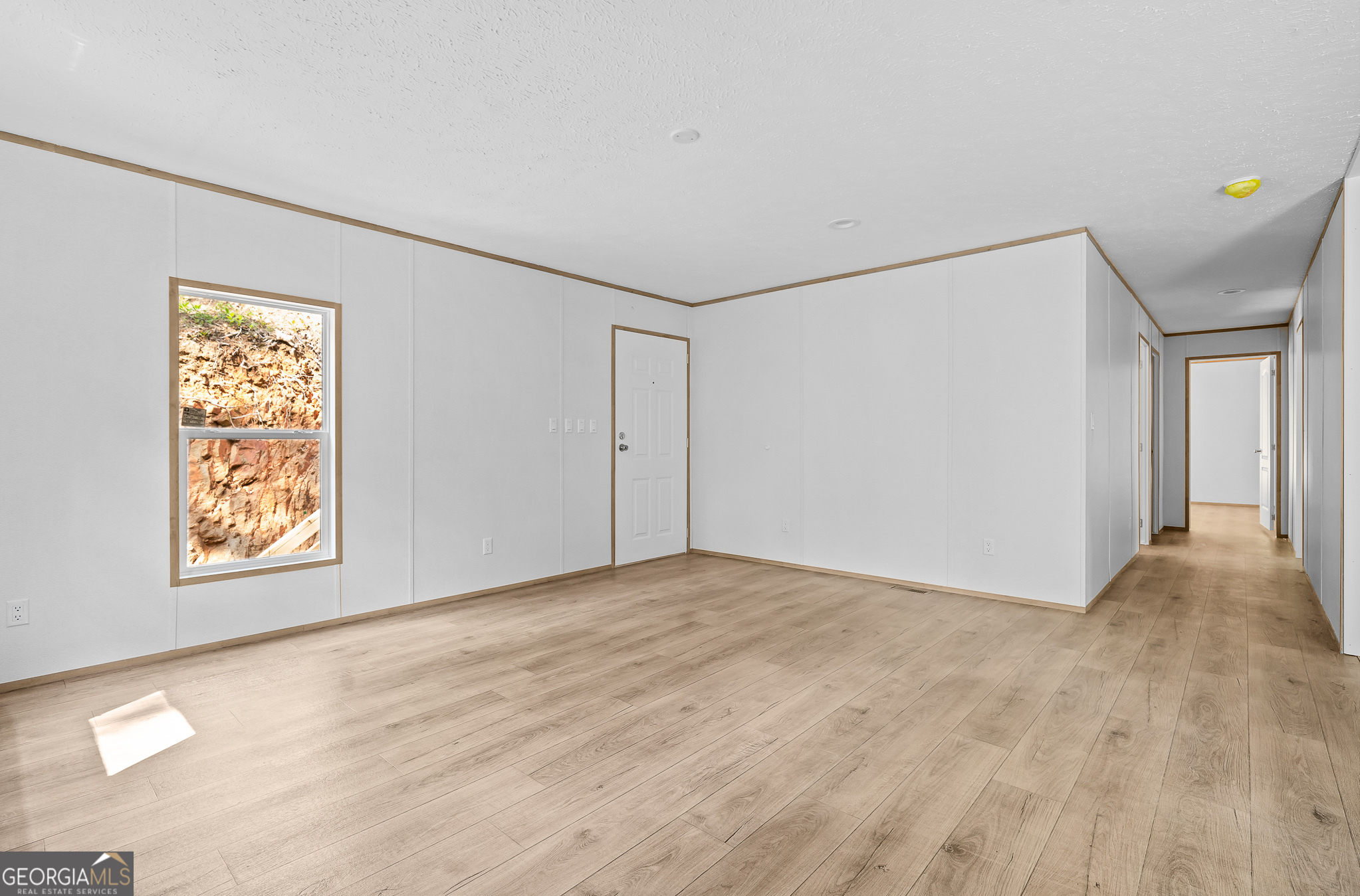 134 Double Line Road Ellijay, GA 30540 - Photo 12 of 33 a view of an empty room with a window