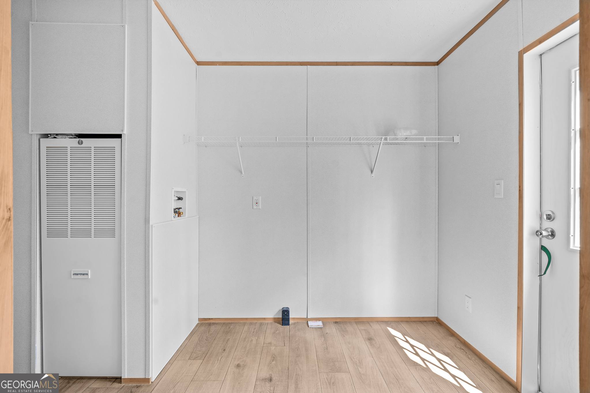 134 Double Line Road Ellijay, GA 30540 - Photo 19 of 33 a view of a room with wooden floor and bathroom