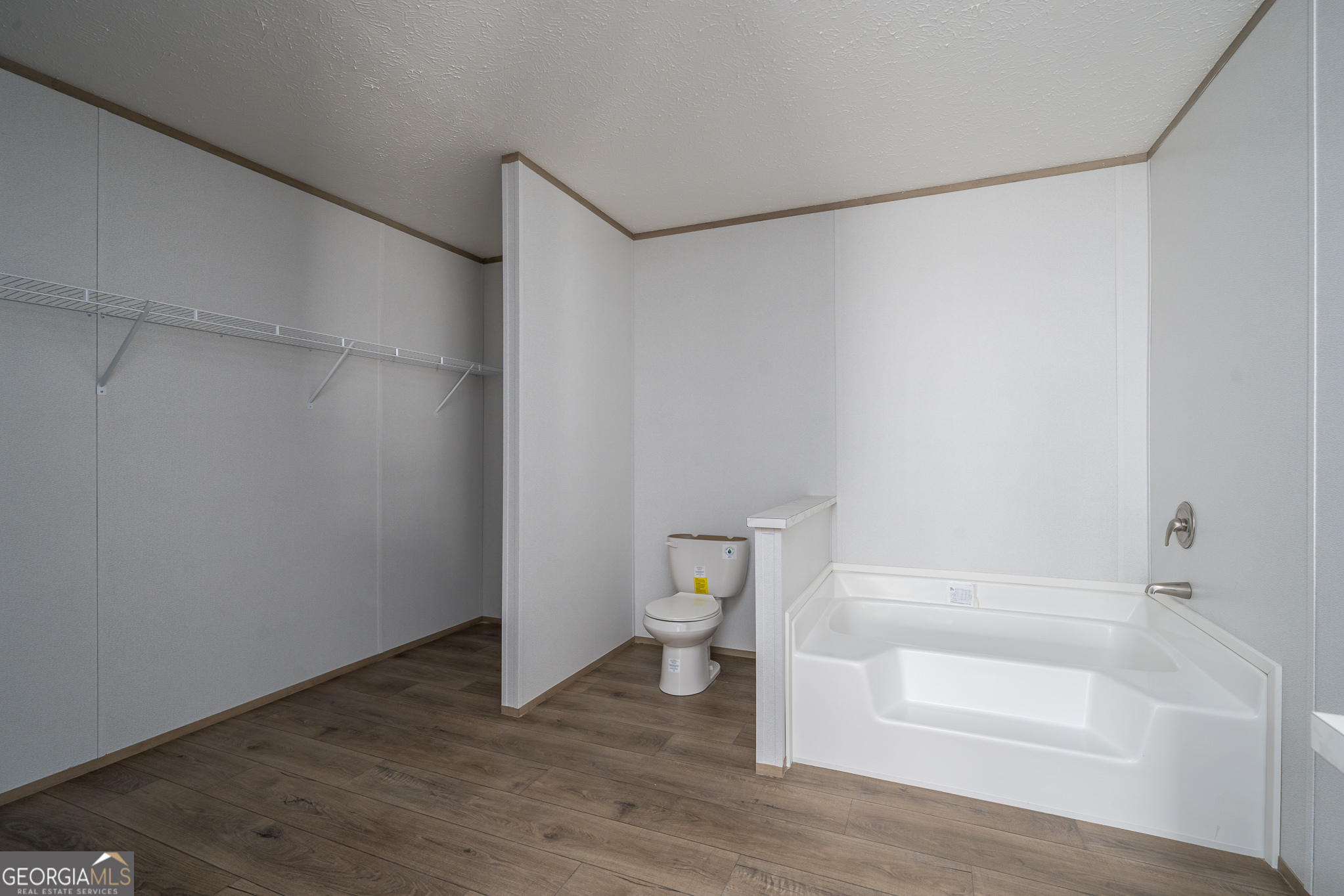 134 Double Line Road Ellijay, GA 30540 - Photo 28 of 33 a bathroom with a shower and toilet