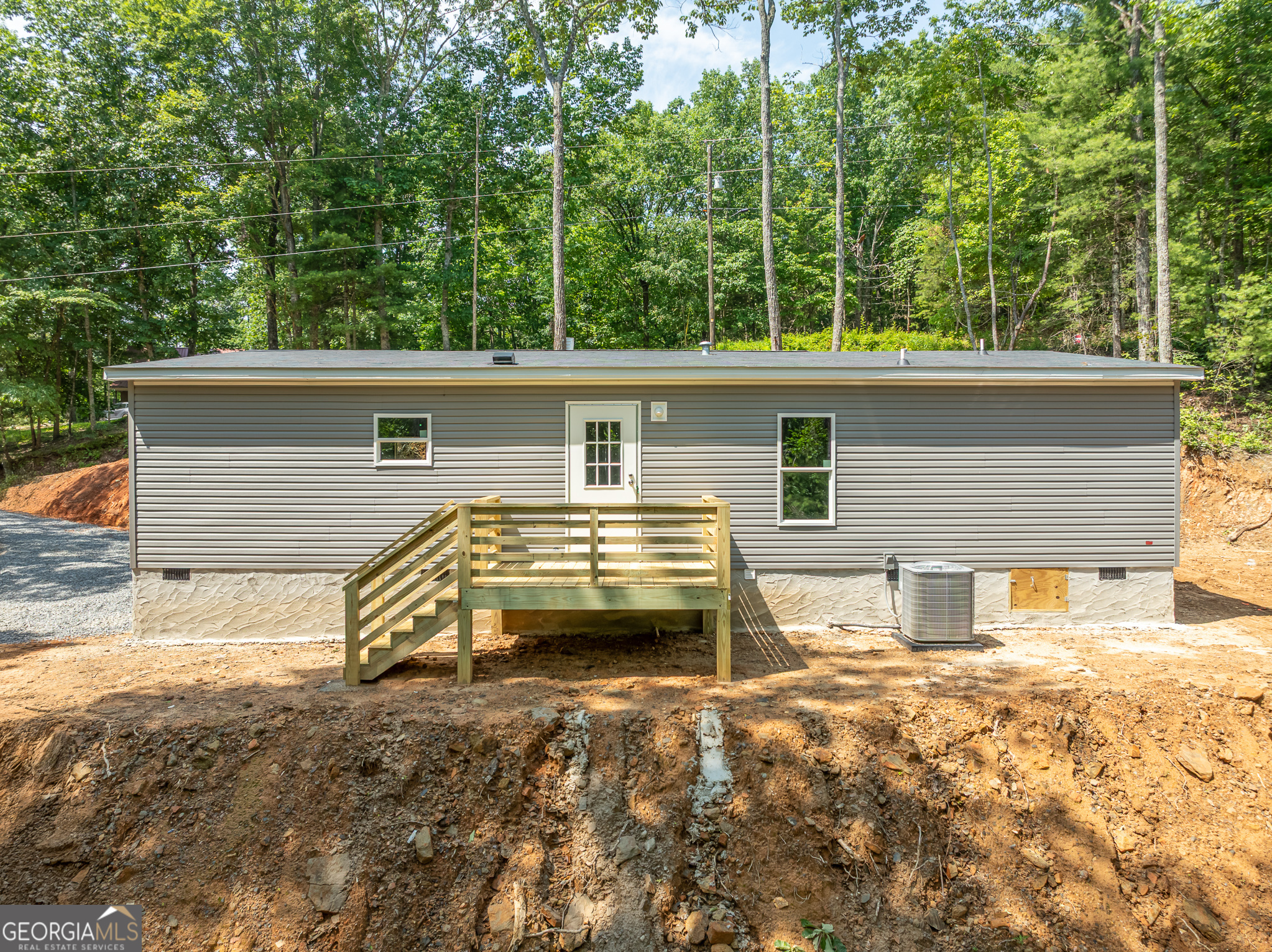 134 Double Line Road Ellijay, GA 30540 - Photo 3 of 33 front view of a house with a yard