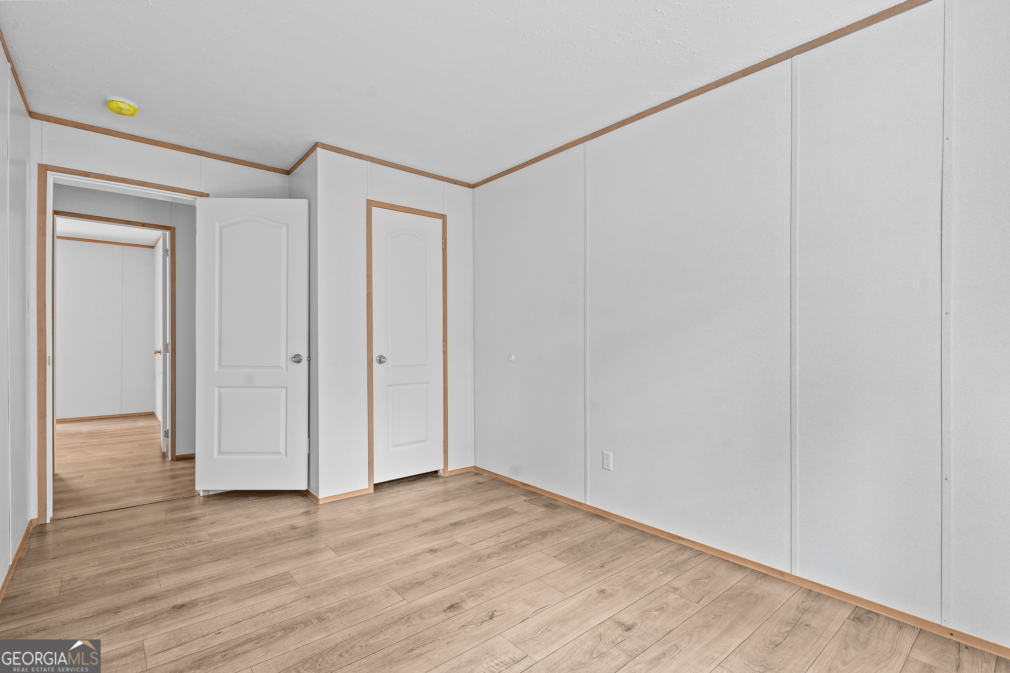 134 Double Line Road Ellijay, GA 30540 - Photo 33 of 33 a view of an empty room with wooden floor