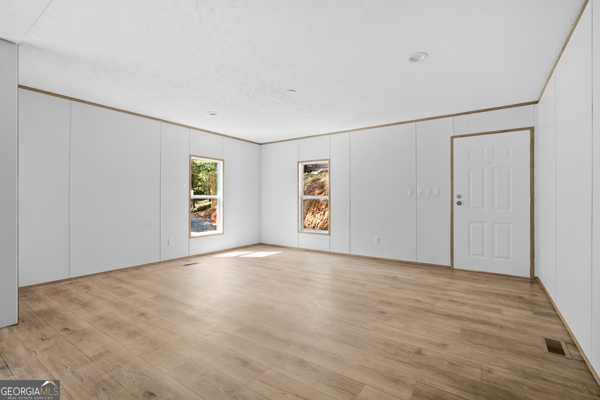 134 Double Line Road Ellijay, GA 30540 - Photo 10 of 33 wooden floor in an empty room