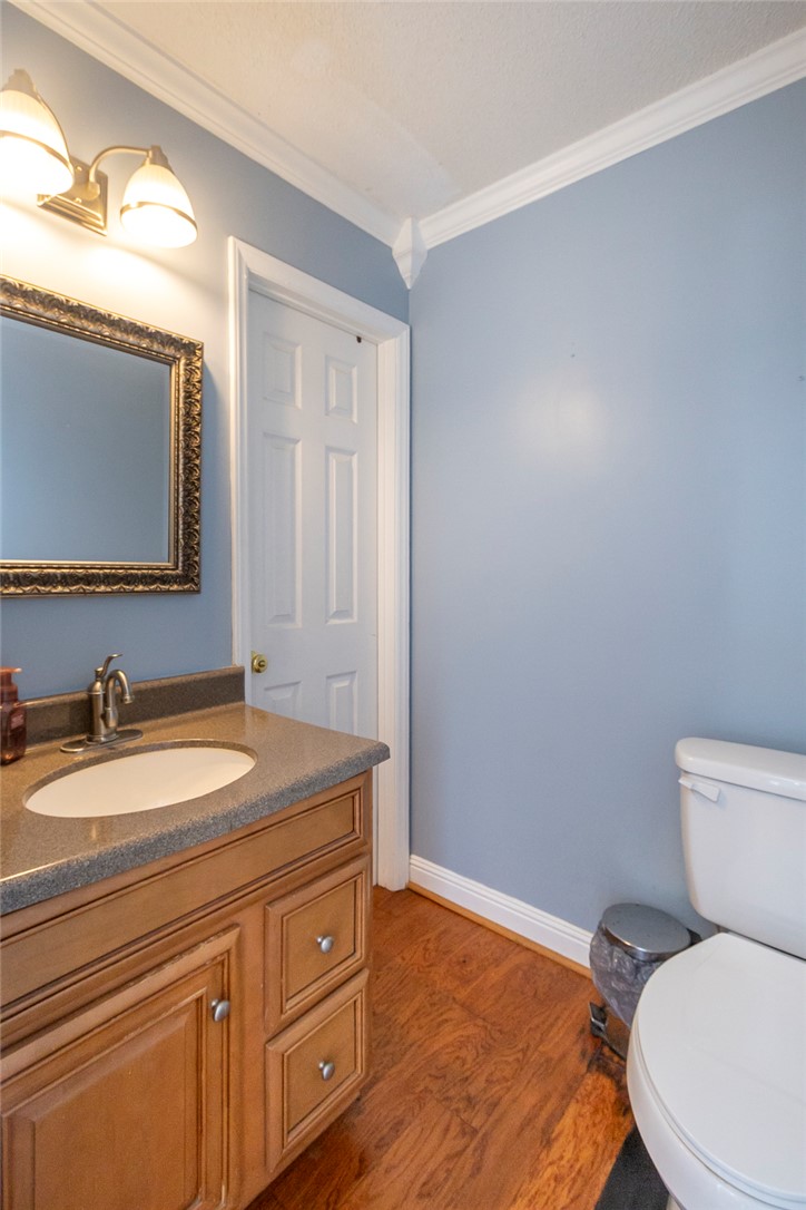 151 Hannah Circle Anderson, SC 29621 - Photo 23 of 46 This bright bathroom features crown molding and rich hardwood flooring.