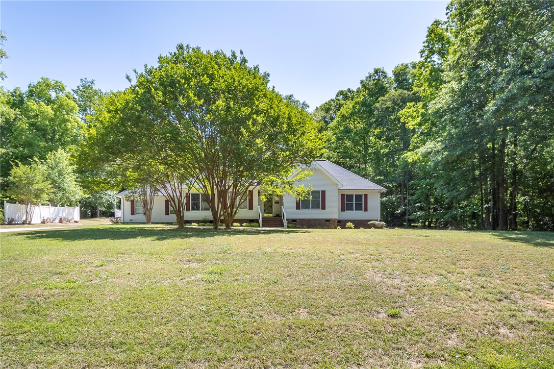 151 Hannah Circle Anderson, SC 29621 - Photo 3 of 46 This charming home features a well-maintained exterior with mature trees and a spacious front yard.
