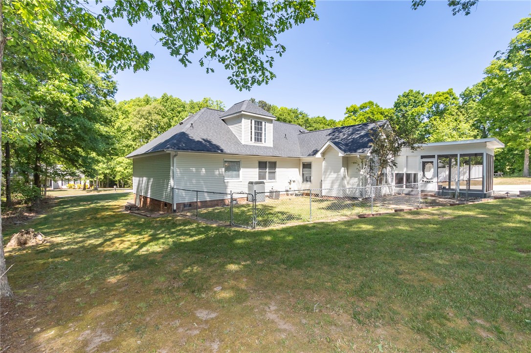 151 Hannah Circle Anderson, SC 29621 - Photo 42 of 46 This property features a charming exterior with a fenced yard, perfect for enjoying outdoor living.