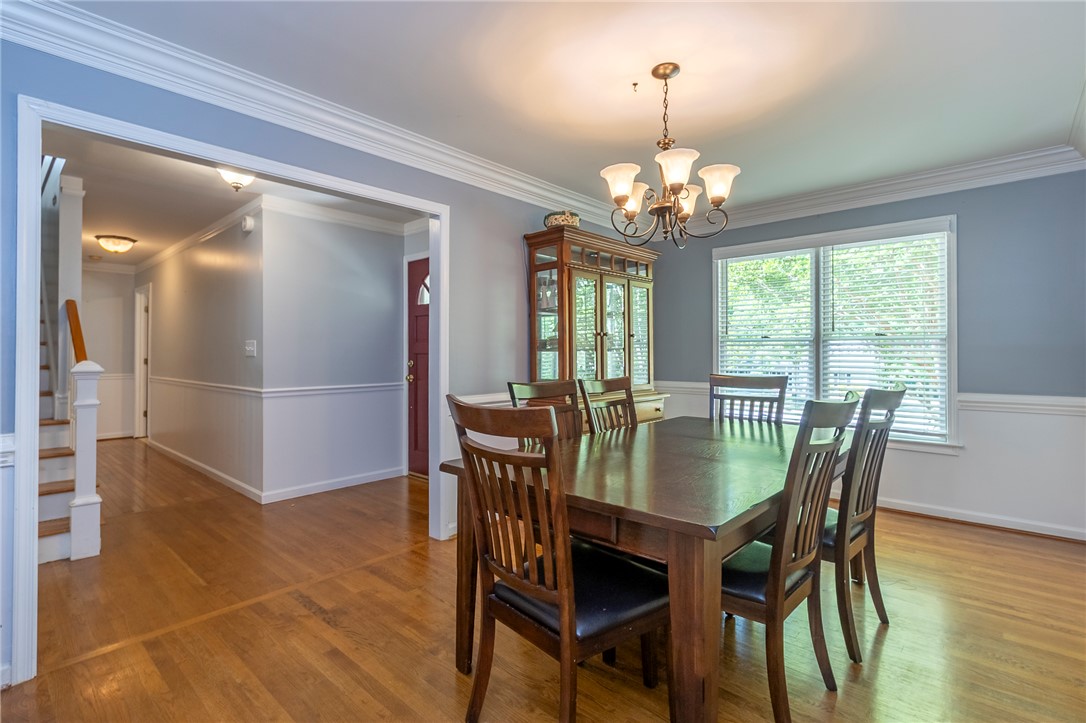 151 Hannah Circle Anderson, SC 29621 - Photo 10 of 46 This inviting dining room features ample space for gatherings, bathed in natural light, with seamless flow to other areas.