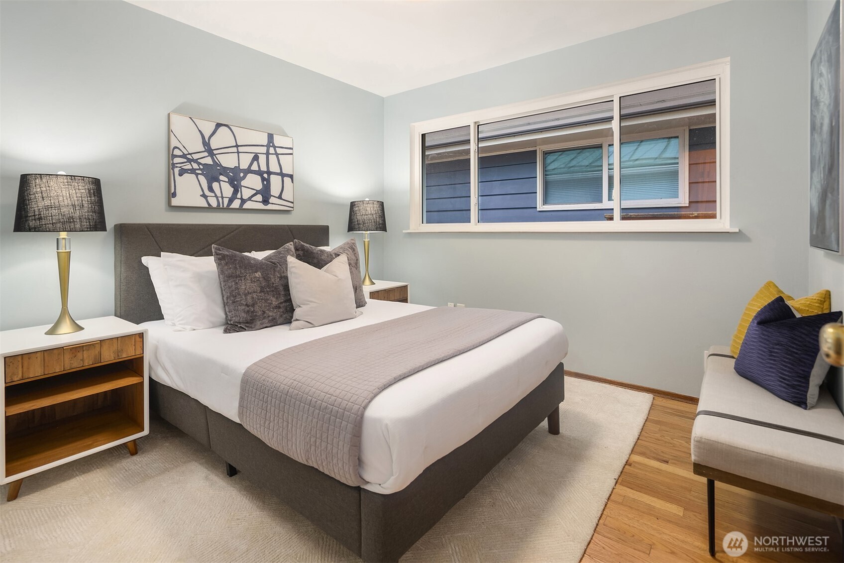 119 North 84th Street Seattle, WA 98103 - Photo 15 of 32 a bedroom with bed and a window