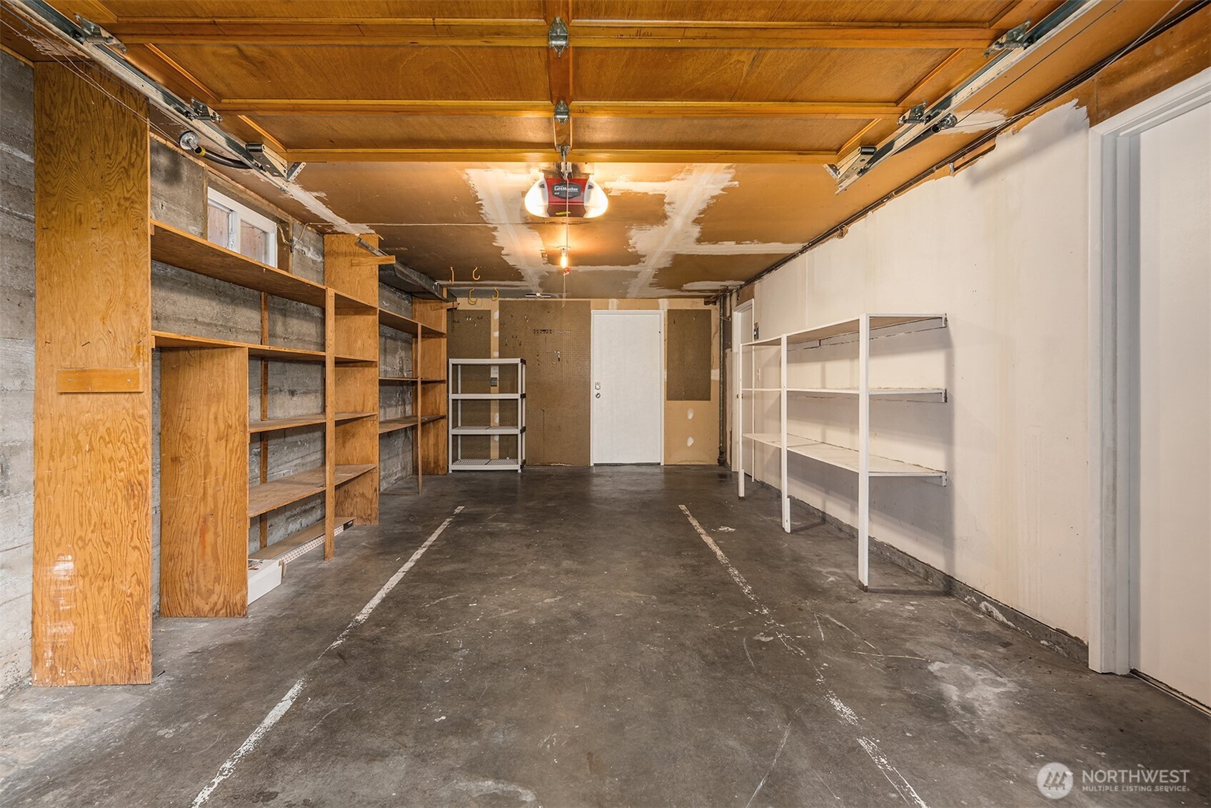 119 North 84th Street Seattle, WA 98103 - Photo 26 of 32 a view of an empty room with a window