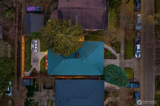 a living room with furniture a rug and a fireplace
