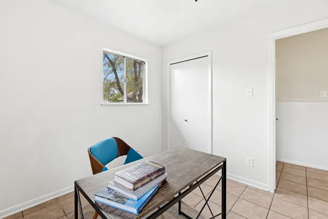 a living room with a couch and a table