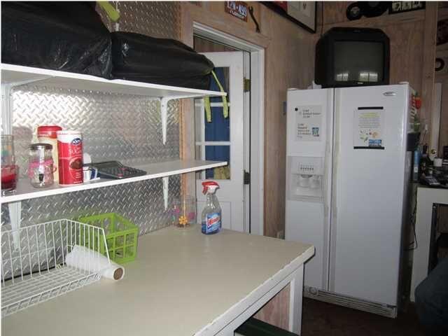 1054 Melton Road Baker, FL 32531 - Photo 12 of 34 a utility room with dryer and washer