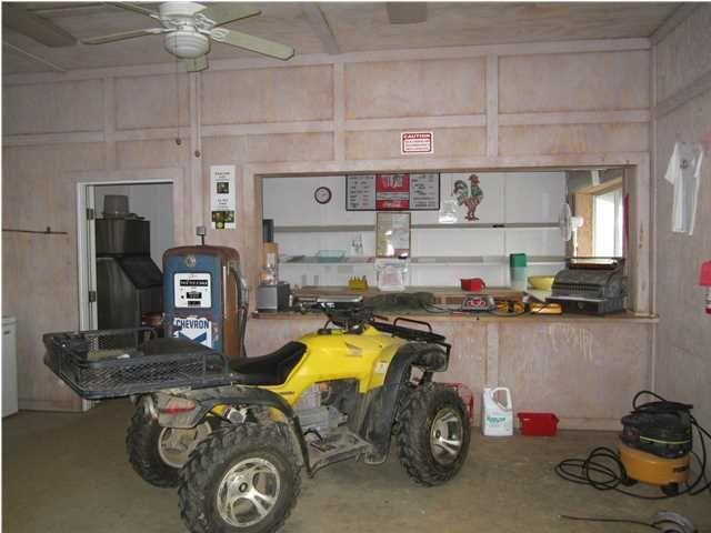 1054 Melton Road Baker, FL 32531 - Photo 14 of 34 a room with storage and utility