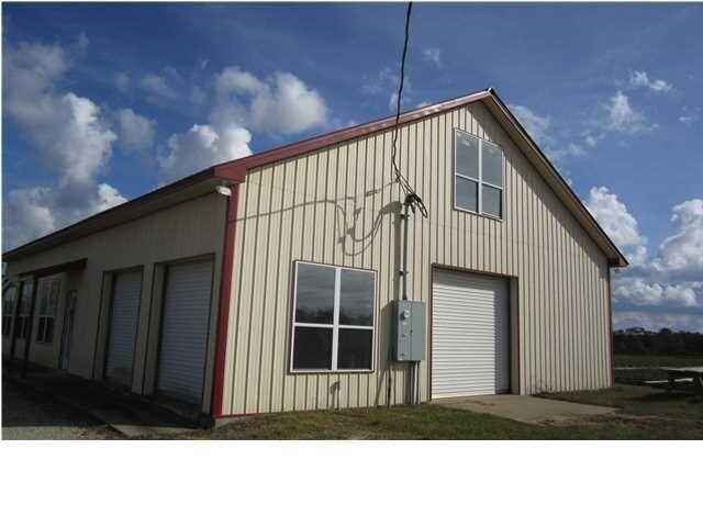1054 Melton Road Baker, FL 32531 - Photo 8 of 34 a black and white photo of a house