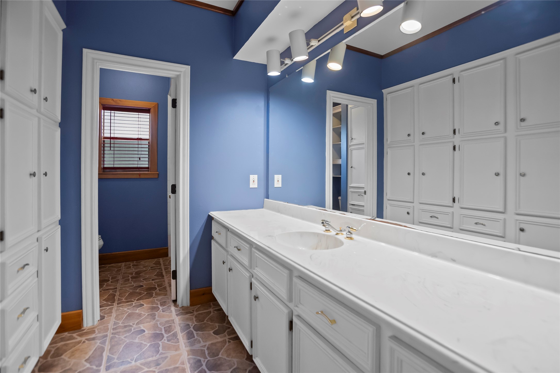 22916 East Martin Drive Porter, TX 77365 - Photo 28 of 43 a bathroom with a sink and a mirror