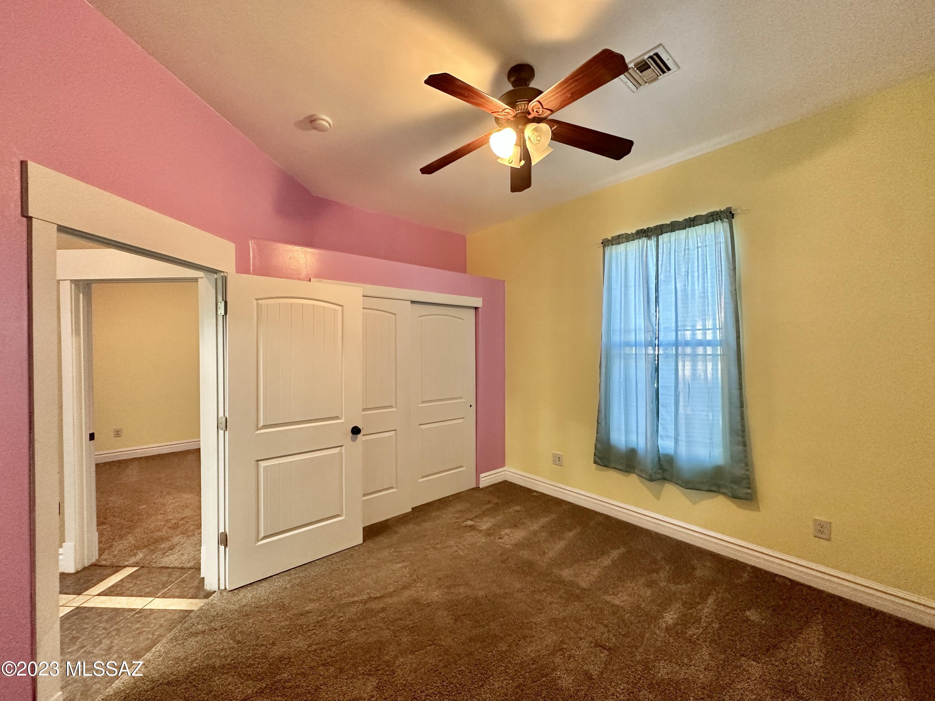 508 Eagle Meadow Loop Thatcher, AZ 85552 - Photo 9 of 32 an empty room with closet and windows