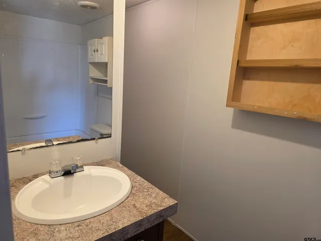 a bathroom with a toilet