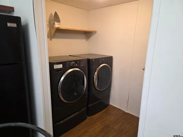 a utility room with dryer and washer