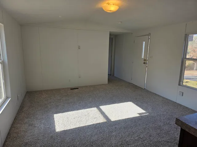 an empty room with windows