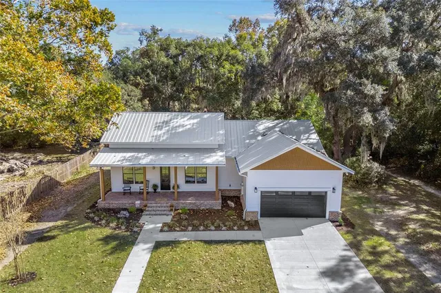 a front view of a house with swimming pool