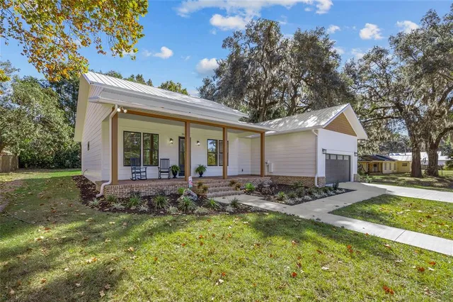 a view of house with outdoor space