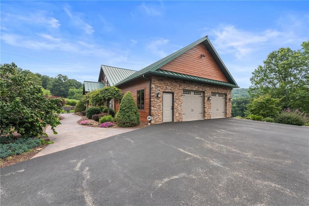10126 Old Rte 56 Shelocta, PA 15774 - Photo 2 of 50 a view of a house with a yard and garage