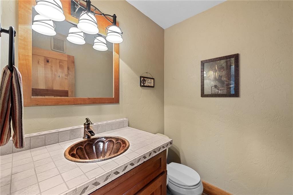 10126 Old Rte 56 Shelocta, PA 15774 - Photo 23 of 50 a bathroom with a toilet a sink and a mirror