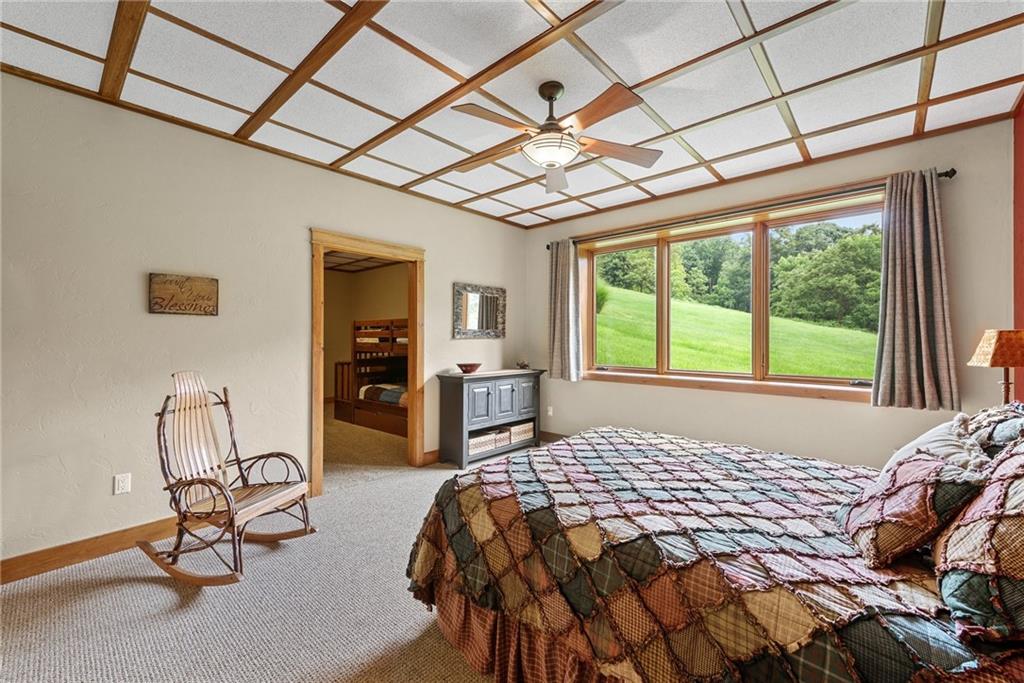 10126 Old Rte 56 Shelocta, PA 15774 - Photo 36 of 50 a bedroom with a bed a chair and a large window