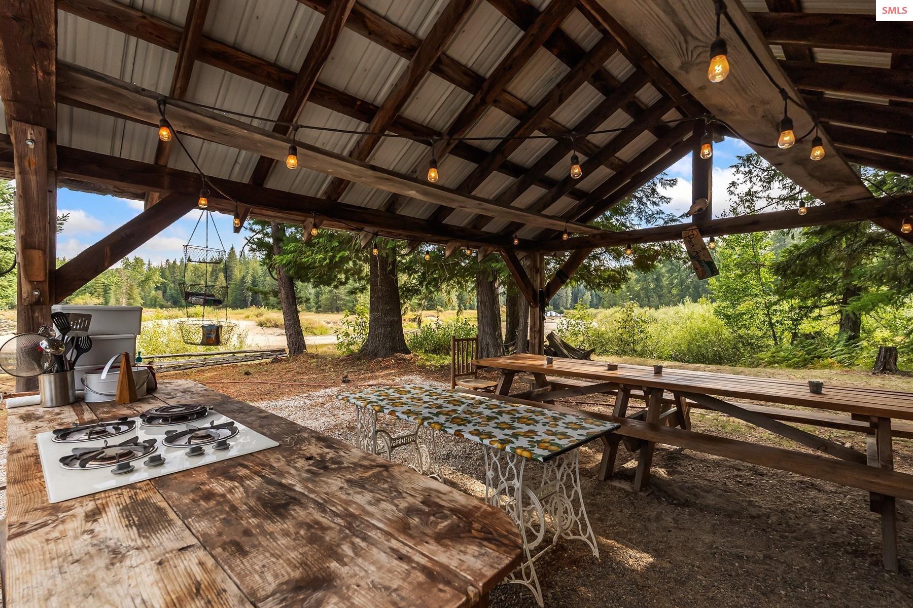 7017-7019 Colburn Culver Road Sandpoint, ID 83864 - Photo 58 of 75 This custom built outdoor entertainment area features a kitchen with Hot/Cold water