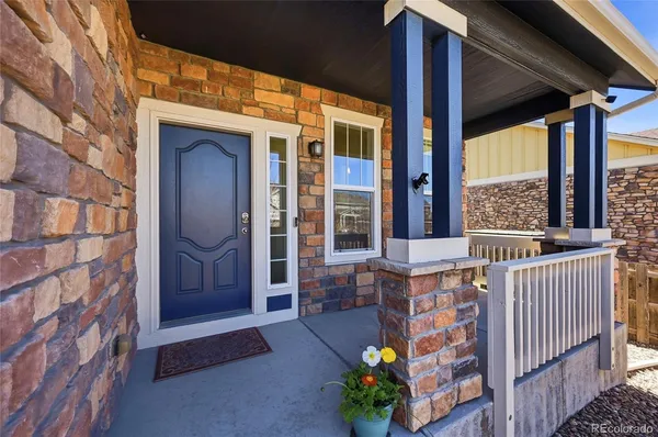 a view of a porch with a furniture