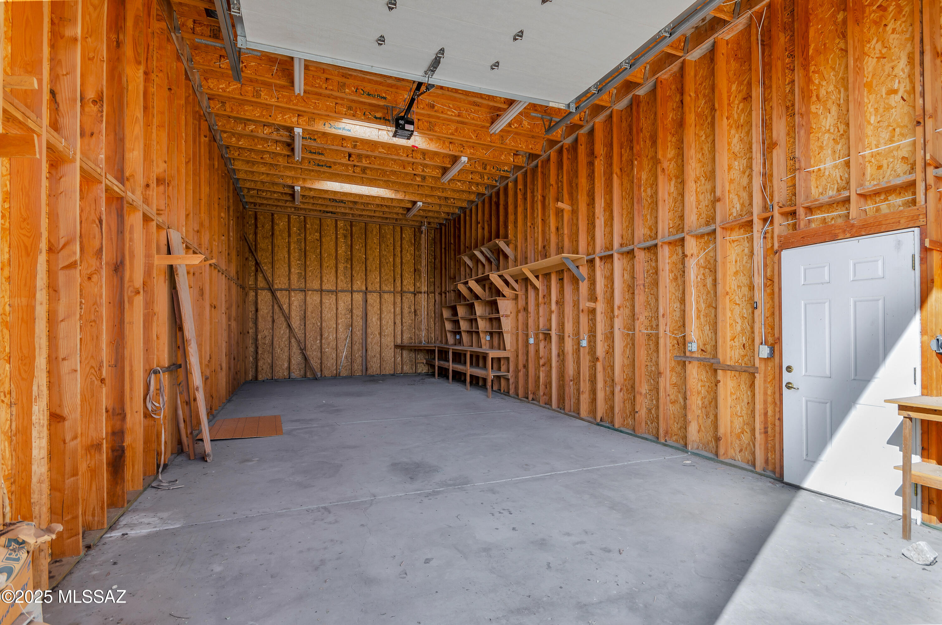 4001 North Harrison Road Tucson, AZ 85749 - Photo 47 of 50 a view of an empty room with wooden walls