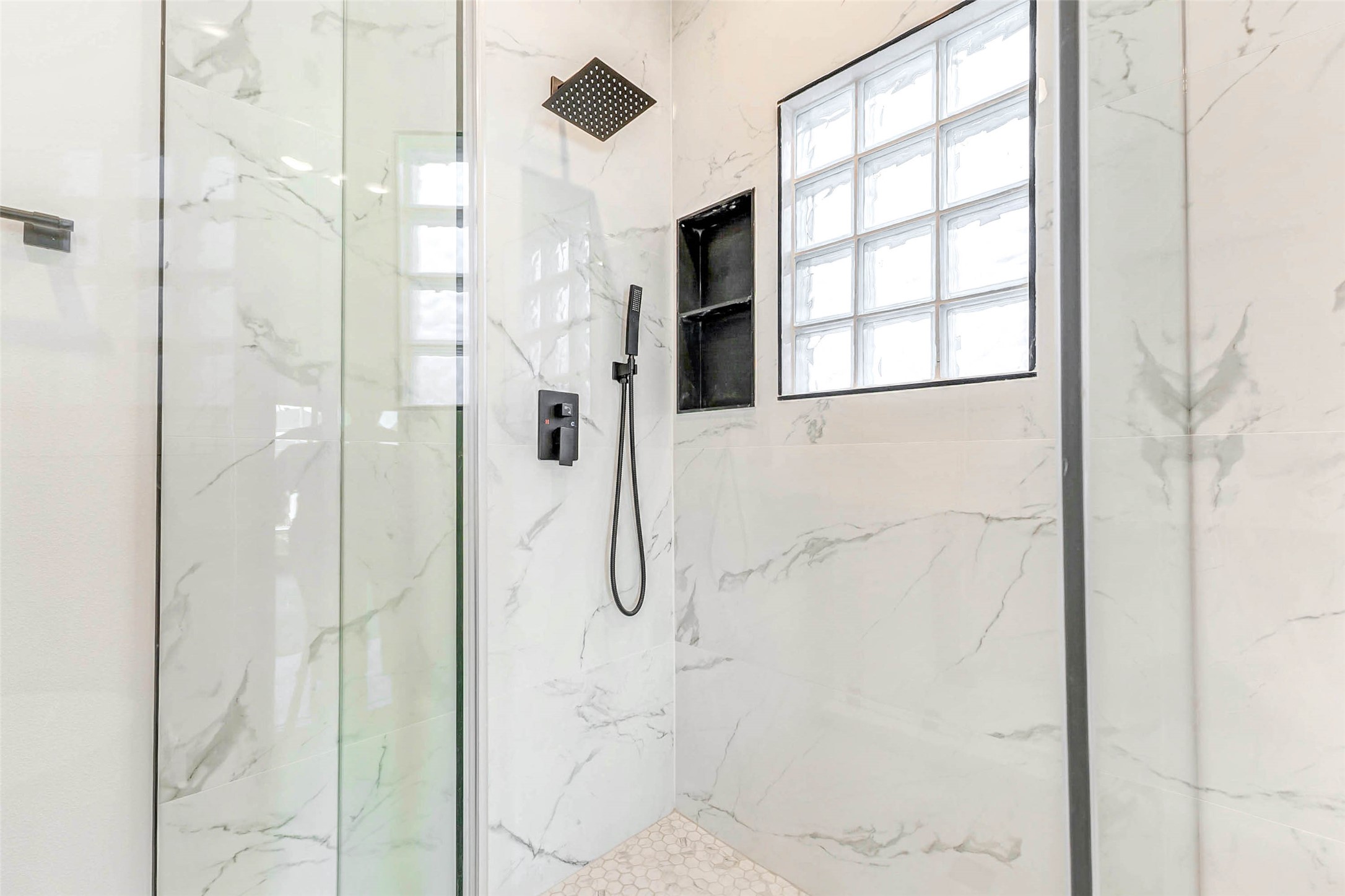 5638 Dolores Street Houston, TX 77057 - Photo 30 of 47 a bathroom with a shower and a sink