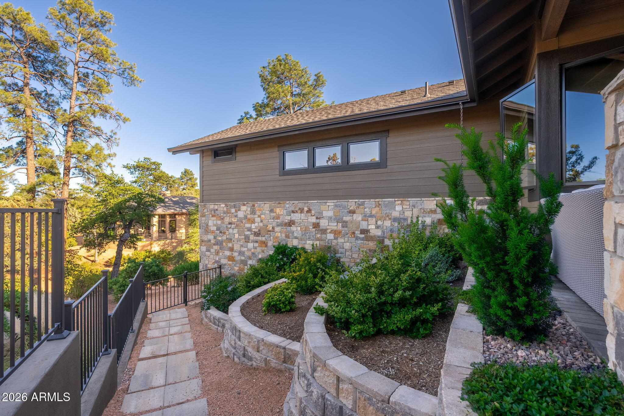 602 North Redbud Circle Payson, AZ 85541 - Photo 57 of 83 a front view of a house with garden