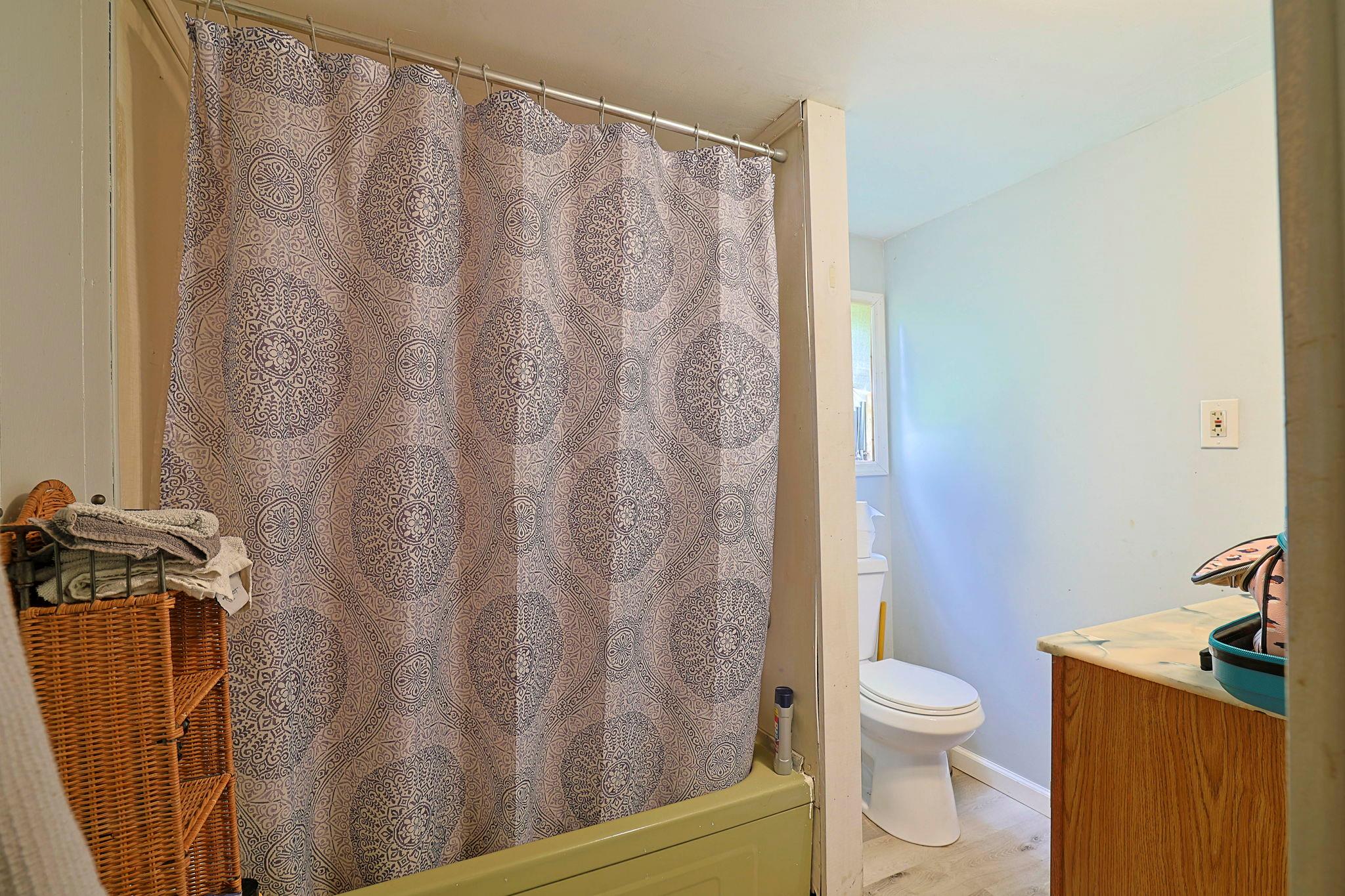 181 Oak Ridge Road Greenfield Park, NY 12435 - Photo 18 of 22 Full bathroom featuring vanity, toilet, and baseboards