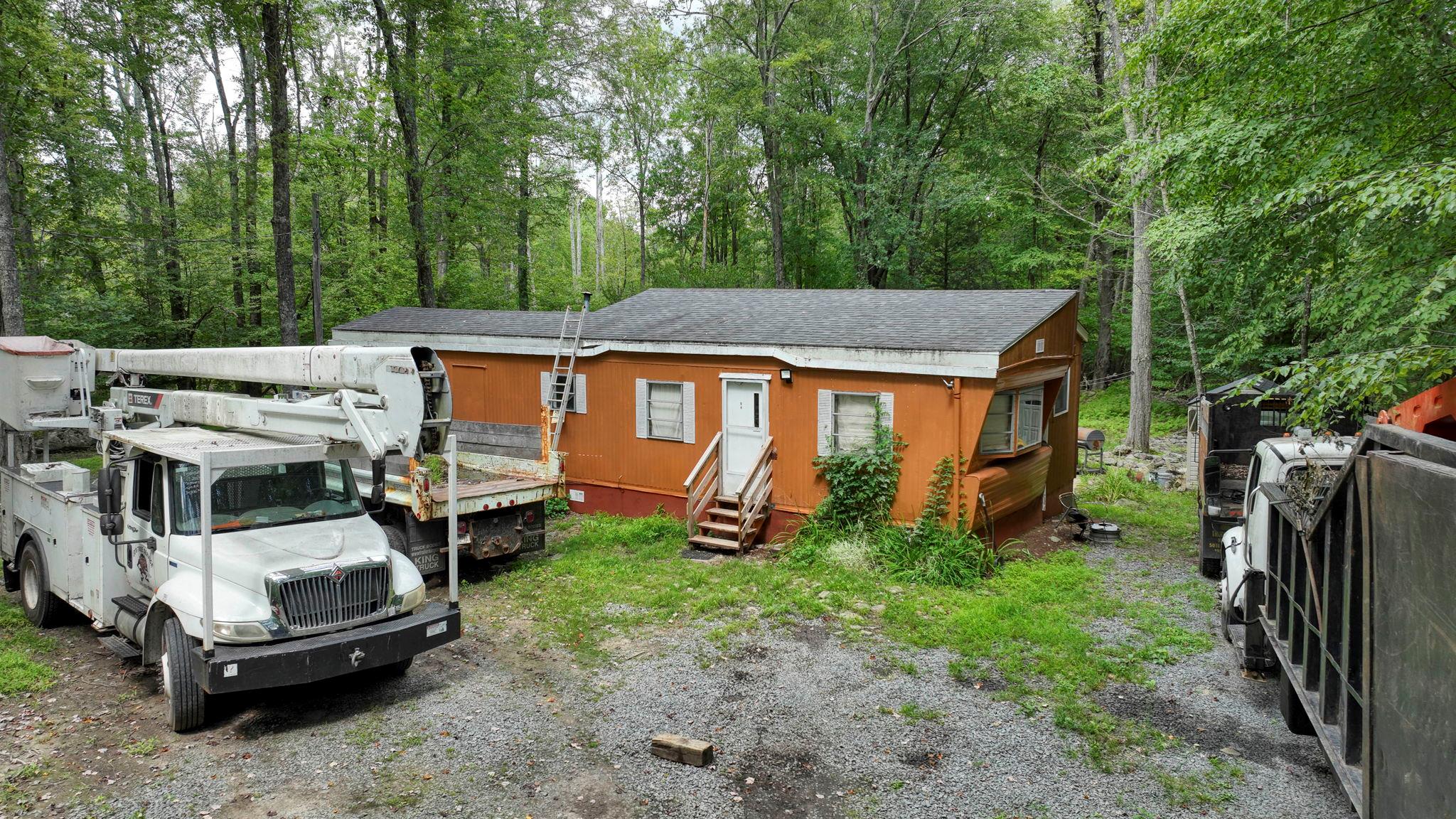 181 Oak Ridge Road Greenfield Park, NY 12435 - Photo 9 of 22 View of front of home featuring a shingled roof and entry steps