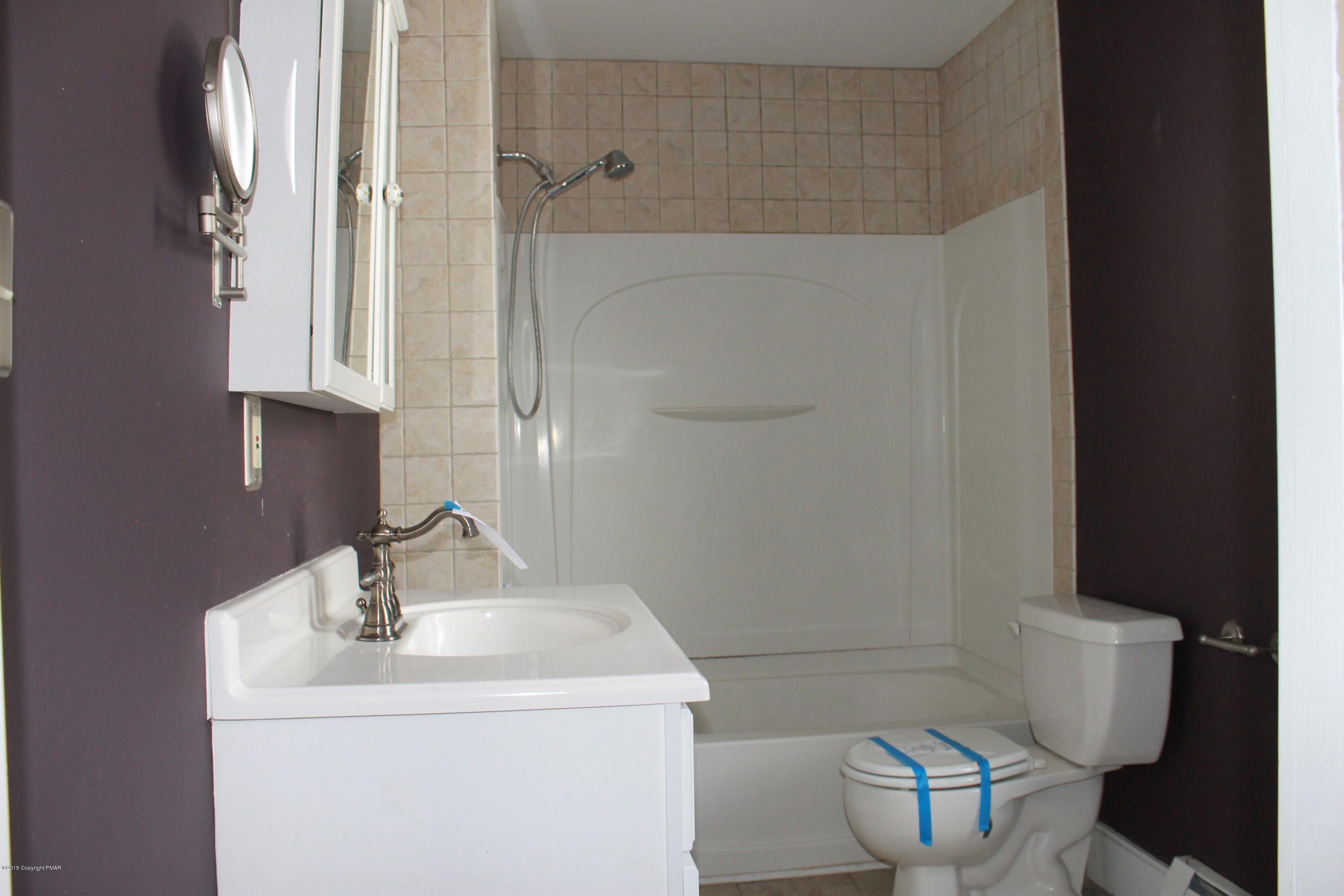 278 Shooktown Road Bangor, PA 18013 - Photo 23 of 33 a bathroom with a sink a toilet and a mirror
