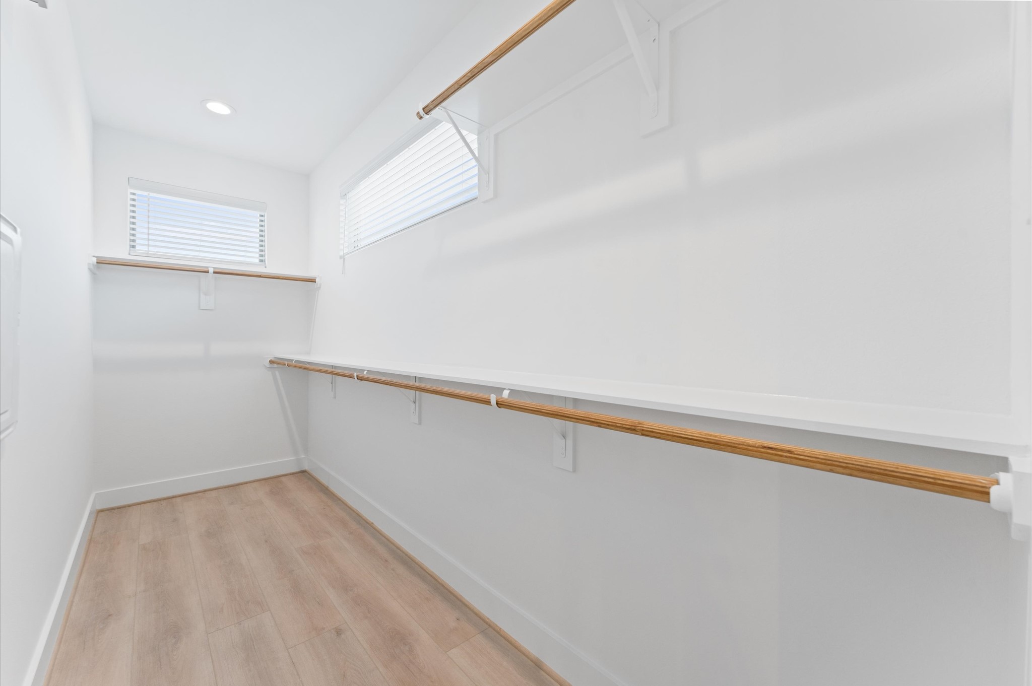 7805 Amelia Road, Unit B Houston, TX 77055 - Photo 32 of 35 Primary closet. Photos are from a previous NJA Homes development. Floor plan, finishes & specifications may vary.