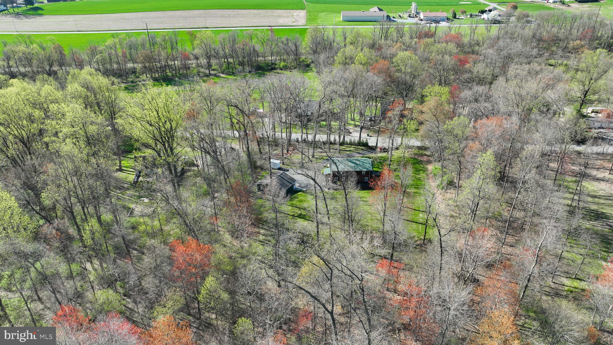 13 Upper Valley Road Christiana, PA 17509 - Photo 53 of 60 a view of a garden with a lake