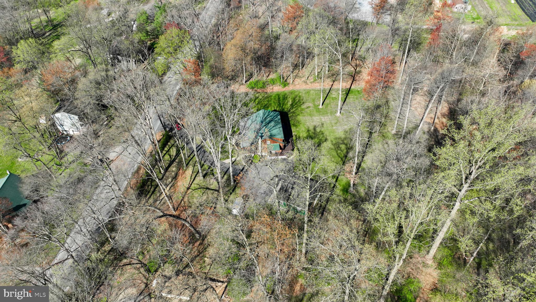 13 Upper Valley Road Christiana, PA 17509 - Photo 55 of 60 a backyard of a building with lots of trees