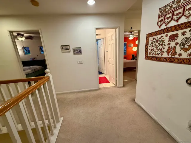 a bedroom with bed and window