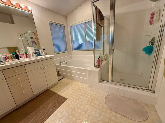 a view of a hallway with windows