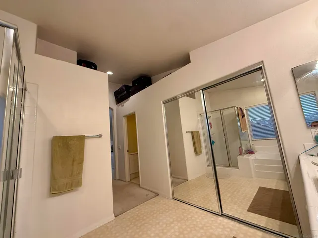 a bathroom with a sink and mirror