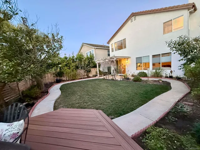 a view of a garden with a patio