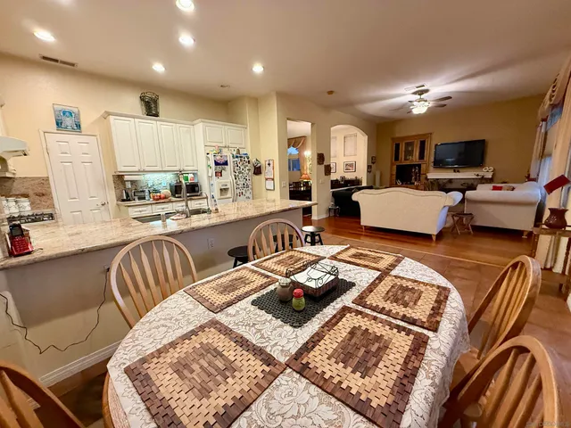 a very nice looking kitchen with a large window