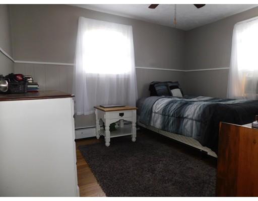 293 Baker Street Fall River, MA 02721 - Photo 23 of 30 a bedroom with a bed and a window