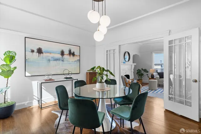 a kitchen with stainless steel appliances granite countertop a stove microwave and cabinets